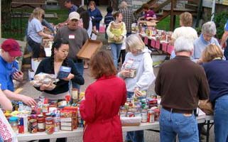 A picture of the people sorting the pantry on the table